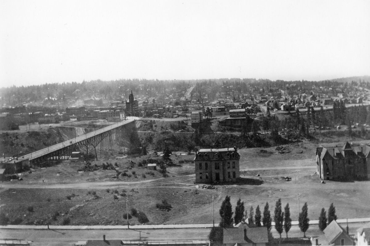 The stately building in the center foreground pictured here circa 1900 was Spokane College, an attempt at a primary through college institution started by Methodists, founded in 1881. The building at right was a dormitory for the college. The land for the buildings came from northside homesteader David P. Jenkins, who also donated land for the Spokane County Courthouse. His daughter donated some of the family land for Spokane Coliseum. (Northwest Room/Spokane Public Library / Spokane Public Library)