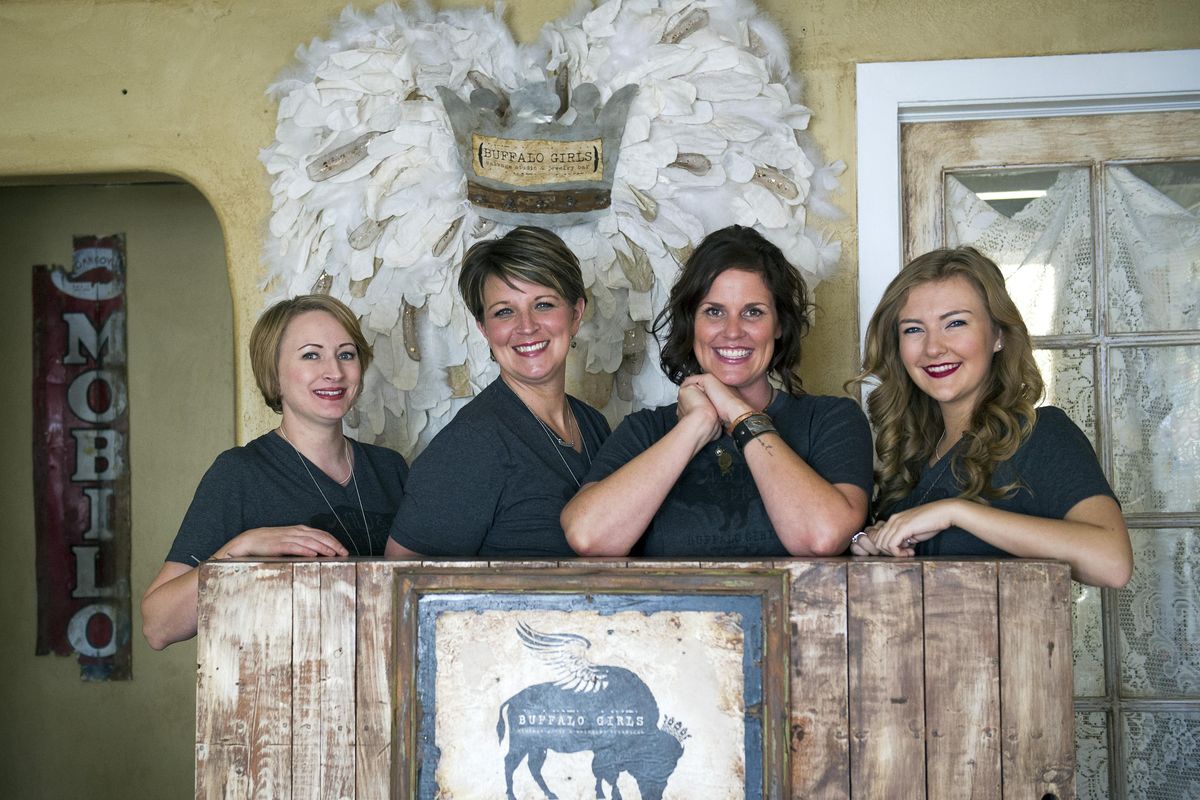 Left to right, employee Brandi Asan, owner Ginger Lyons, owner Tamra Brannon, and employee Emma Marshall of Buffalo Girls Salvage jewelry store make and sell repurposed vintage jewelry as well as home decor and artwork.  (Colin Mulvany)