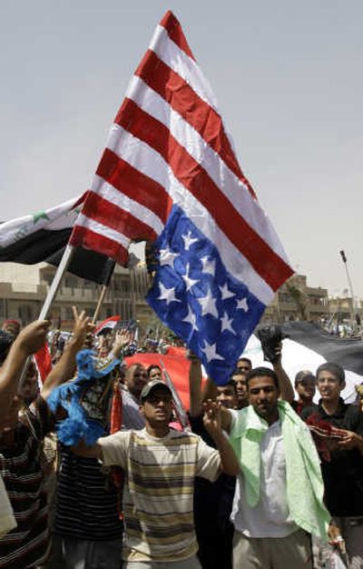 
Supporters of Muqtada al-Sadr rally against a U.S-Iraqi security pact in the Shiite stronghold of Sadr City in Baghdad on Friday. Associated Press
 (Associated Press / The Spokesman-Review)