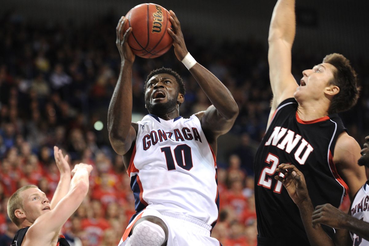 Coach Mark Few is hoping to get forward Guy Landry Edi, center, back on track. Edi has slumped after a big start this season. (Tyler Tjomsland)