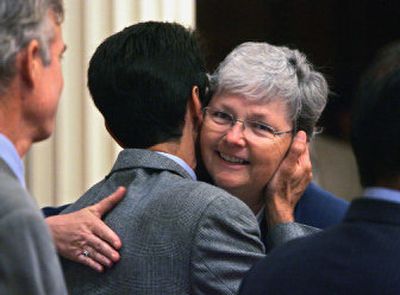 
State Sen. Christine Kehoe, D-San Diego, right, one of the California Legislature's six gay members, hugs Assemblyman Mark Leno, D-San Francisco, after his same-sex marriage bill was approved by the Senate Thursday.
 (Associated Press / The Spokesman-Review)