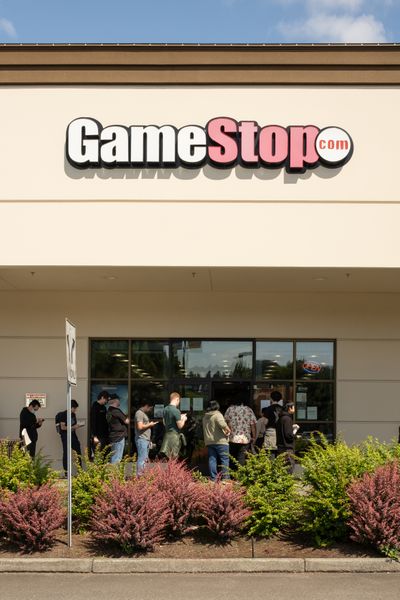 People wait line in for Nintendo Switch 2s at a Gamestop on June 4, in Tukwila, Wash. The online marketplace eBay rejected a proposal by GameStop to combine the two companies in a cash-and-stock deal worth about $55 billion on May 12, calling it 