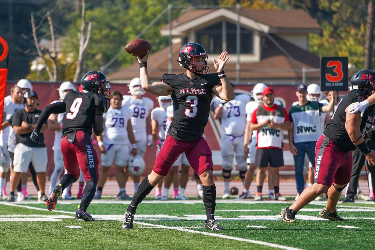 Whitworth quarterback Ryan Blair looks to pass against Linfield during a Northwest Conference game Saturday at the Pine Bowl.  (Caleb Flegel/Whitworth Athletics)