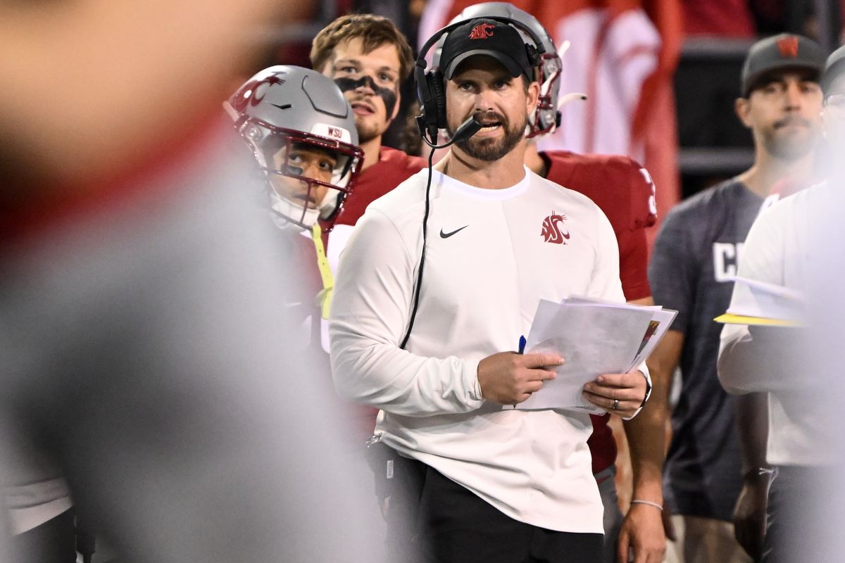 Washington State Cougars head coach Jimmy Rogers calls a play against the Idaho Vandals during the first half of a college football game on Saturday, Aug. 30, 2025, on Gesa Field in Martin Stadium in Pullman, Wash. (Tyler Tjomsland/The Spokesman-Review)
