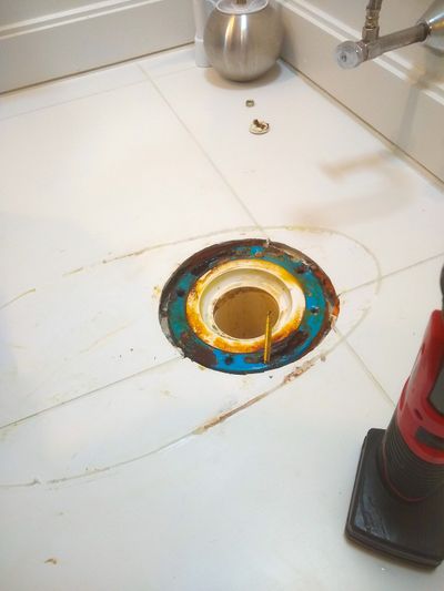 New flooring installed over old can bury a toilet flange, as pictured here. Don’t assume that your flooring contractor knows how to reseat a toilet after a job like this.  (Tribune Content Agency)