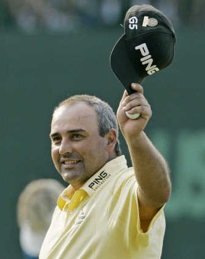 
Angel Cabrera acknowledges the crowd after 18th hole.Associated Press
 (Associated Press / The Spokesman-Review)