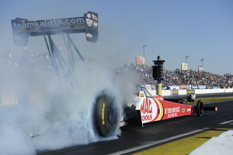 Doug Kalitta prepares for Saturday's qualifying run that netted his Top Fuel team the top spot in Sunday's final eliminations at teh NHRA Mello Yello Drag Racing Series stop in Arizona.