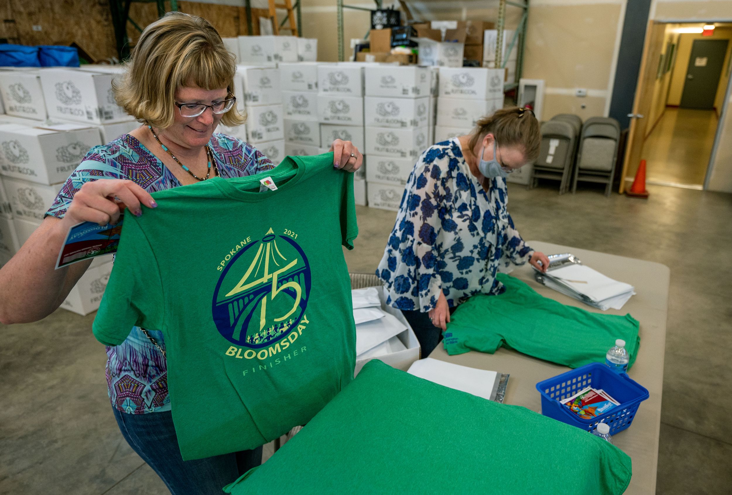 'You call, they're here' Bloomsday volunteers prep finisher Tshirts