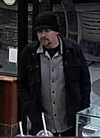 Spokane police are asking for the public’s help in identifying this man who police say robbed a South Hill store April 19.  (Courtesy of Spokane Police Department)