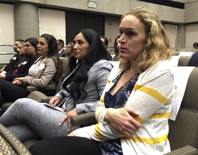 Renee Wetzel, right, whose husband died in the 2015 San Bernardino terrorist attack, watches as fellow family members of mass shooting victims call on California’s public pension fund to stop investing in retailers that sell assault weapons in Sacramento, Calif., on Monday, March 19, 2018. (Associated Press)
