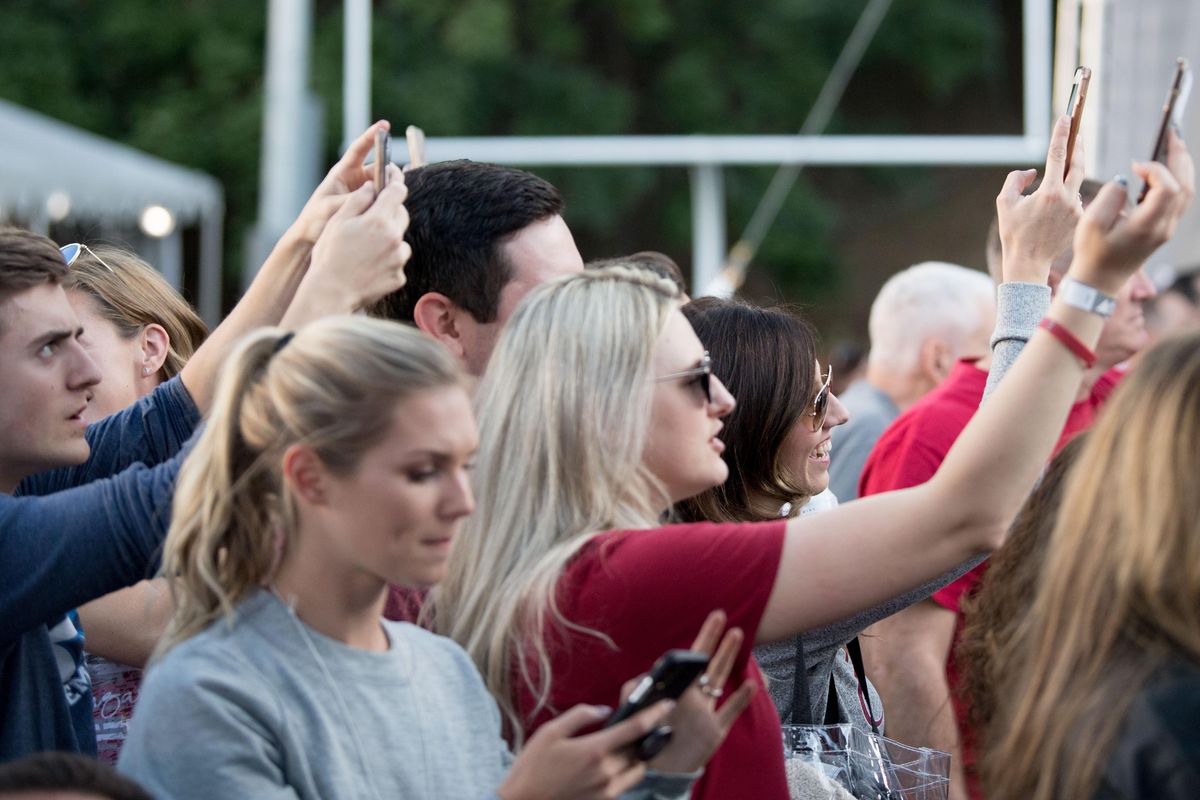 Fans snap photos of former WSU quarterback Gardner Minshew before the start of the first half of a college football game on Saturday, September 21, 2019, at Martin Stadium in Pullman, Wash. (Tyler Tjomsland / The Spokesman-Review)