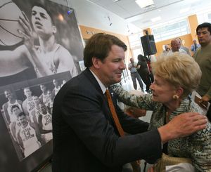 New UTEP men's basketball coach Tim Floyd embraces Mary Haskins, widow of long-time UTEP coach Don Haskins, following a news conference Tuesday, March 30, 2010, in El Paso, Texas. Floyd was announced as successor to Tony Barbee as coach. Floyd worked as an assistant for Haskins in the 1980s. (Victor Calzada / El Paso Times)