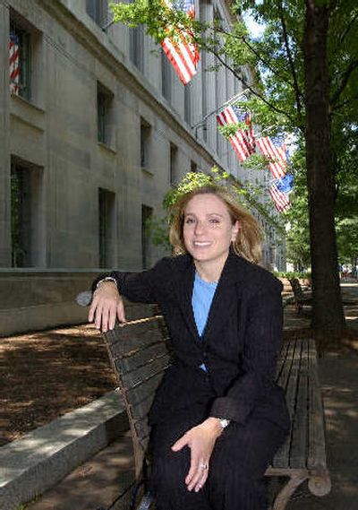 
Former Olympic gymnast Keri Strug is seen outside the Justice Department in Washington.
 (Associated Press / The Spokesman-Review)