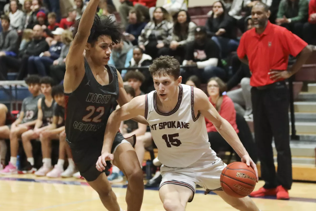 Mt. Spokane forward Maverick Sanders drives to the hoop against North Central on Feb. 11, 2023.  (Cheryl Nichols/For The Spokesman-Review)