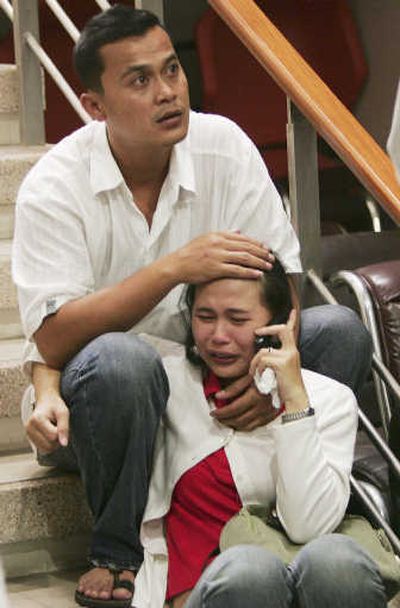 
Relatives of a crash victim cry at Phuket airport on SundayAssociated Press photos
 (Associated Press photos / The Spokesman-Review)