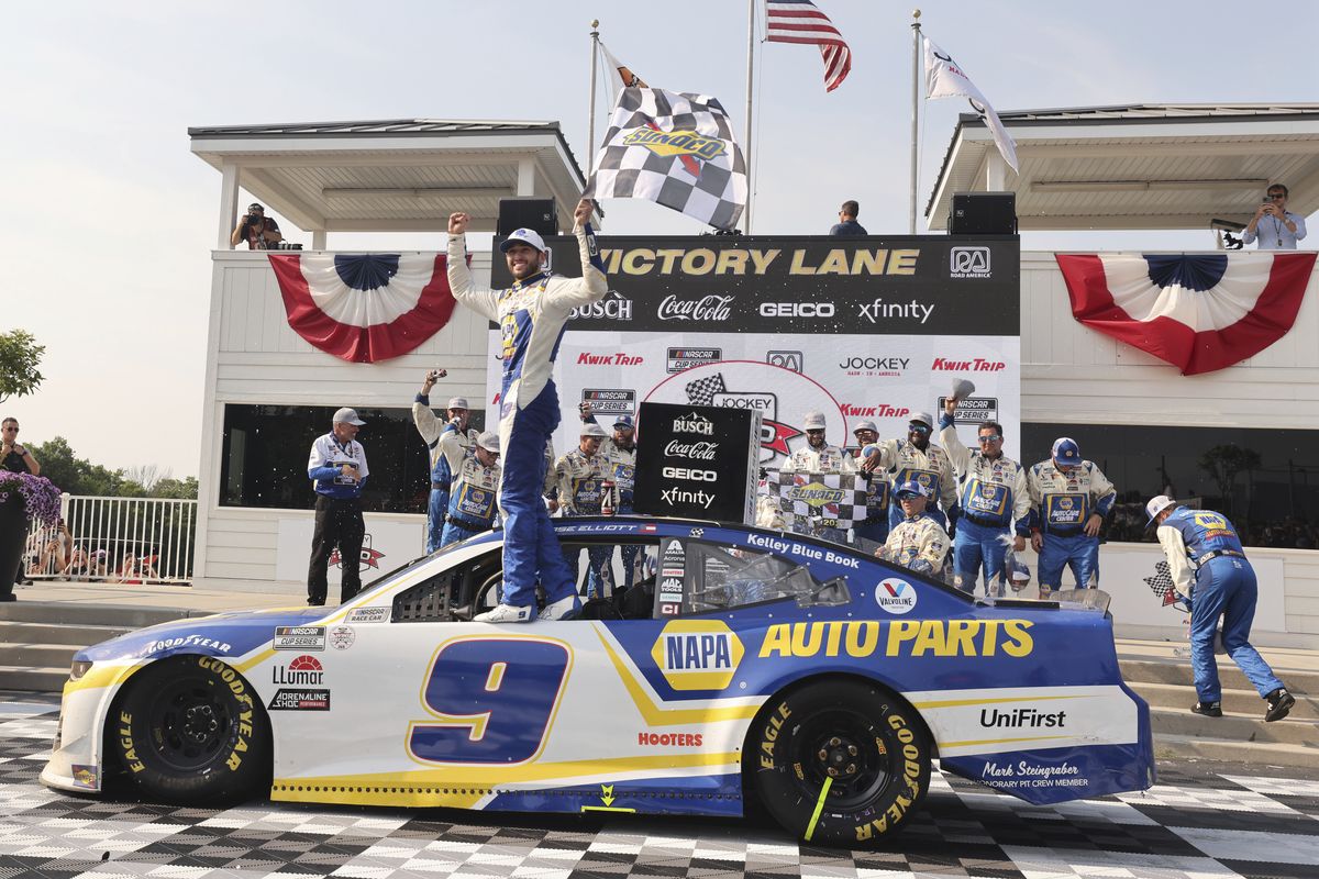 Chase Elliott (9) celebrates his victory in a NASCAR Cup Series auto race Sunday, July 4, 2021, at Road America in Elkhart Lake, Wis.  (Jeffrey Phelps)