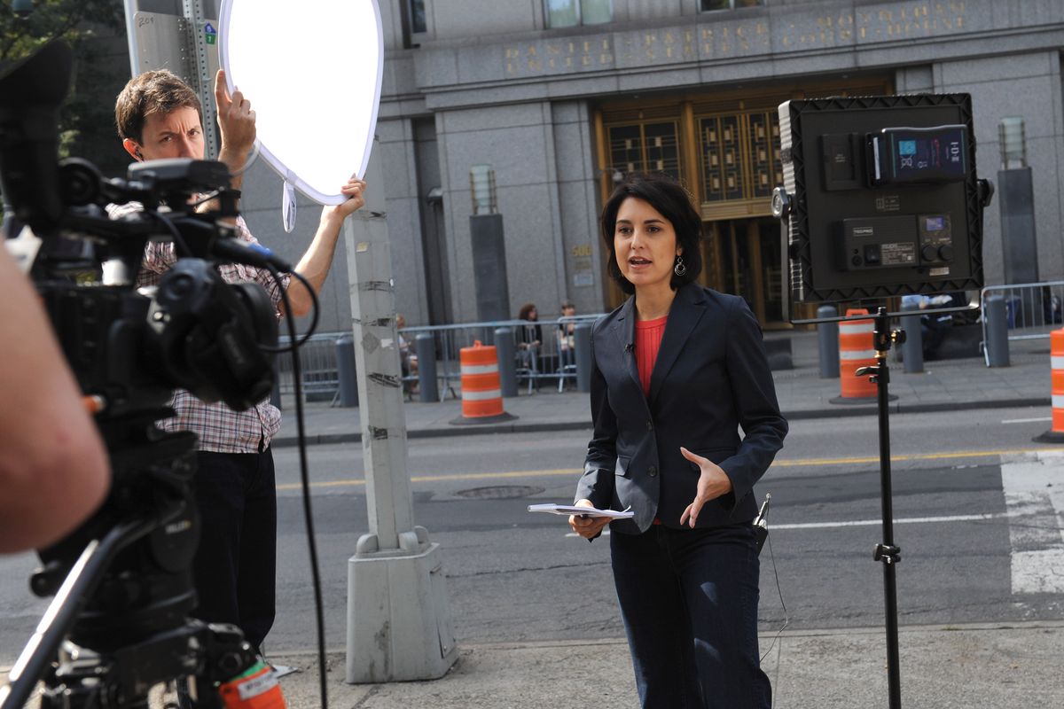A reporter reports liveoutside Manhattan federal court, Saturday, Oct. 6, 2012, in New York. An ailing extremist Egyptian-born preacher and four other terrorism suspects arrived in the United States from England early Saturday under tight security to face trial, and two appeared within hours in a court in the state of Connecticut. The preacher, Abu Hamza al-Masri, was taken to a lockup next to the federal courthouse in lower Manhattan to face charges that he conspired with Seattle men to set up a terrorist training camp in Oregon and that he helped abduct 16 hostages, two of them American tourists, in Yemen in 1998. (Louis Lanzano / Fr77522 Ap)