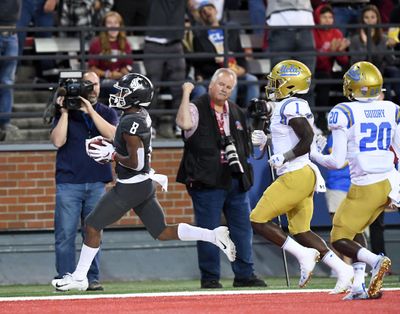 Washington State Cougars wide receiver Easop Winston Jr. (8) hauls in a touchdown pass during the first half of a college football game on Saturday, September 21, 2019, at Martin Stadium in Pullman, Wash. (Tyler Tjomsland / The Spokesman-Review)