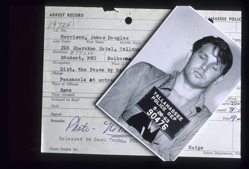 This Sept. 28, 1963 photo released by the Florida Dept of State archives, shows the arrest mug and record of singer Jim Morrison. Morrison was arrested following a football game at Florida State University. Next Thursday, Dec. 9, 2010 Gov. Charlie Crist, will argue before the state's clemency board to pardon Jim Morrison, who was convicted in 1968 of indecent exposure.  ((AP Photo/Florida Dept of State))