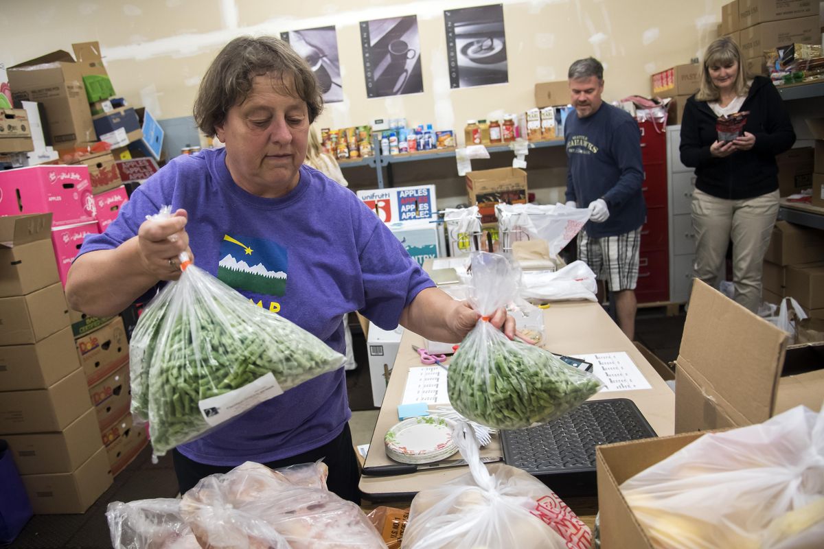 Bette Monahan helped start the Mead Food Bank over 20 years ago. The community food bank serves about 40 families a week. (Colin Mulvany / The Spokesman-Review)