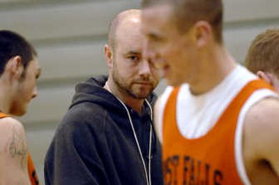 
Post Falls basketball coach Mike McLean is shown during practice on Jan. 14. Post Falls School District is working on a new code of conduct for students as part of an examination of its extracurricular programs.
 (Kathy Plonka / The Spokesman-Review)