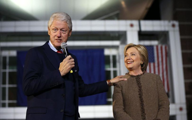 Democratic presidential candidate Hillary Clinton and her husband, former President Bill Clinton, speak at a 