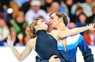 
Brooke Castile and Benjamin Okolski surprised the field and pleased the Arena crowd Friday with their program that won the Senior Pairs.
 (Colin Mulvany / The Spokesman-Review)
