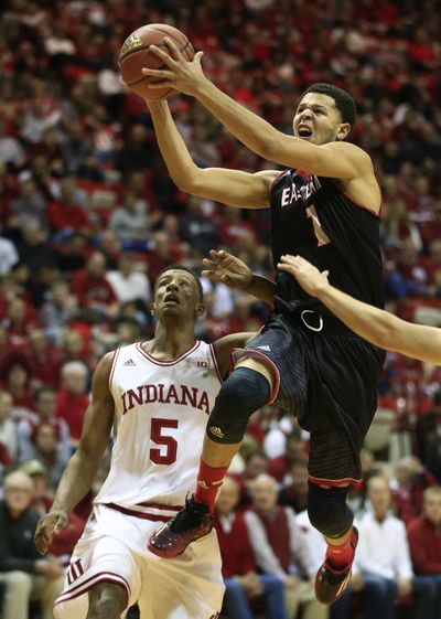 Eastern's Tyler Harvey, going up for two points in win over Indiana earlier this season, is the NCAA scoring leader at 23.4 points a game. (Associated Press)