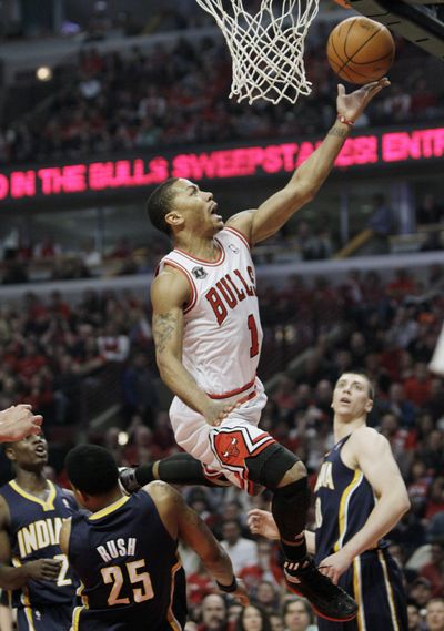 Chicago’s Derrick Rose drives to the basket against the Indiana Pacers during the first quarter of the Bulls’ 104-99 Game 1 victory. (Associated Press)