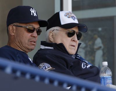 FILE - This March 6, 2010, file photo shows New York Yankees Hall of Famer Reggie Jackson, left, sitting with Yankees principal owner and chairman George Steinbrenner during a Yankees spring training baseball game against the Toronto Blue Jays at Steinbrenner Field in Tampa, Fla.  Steinbrenner, who rebuilt the New York Yankees into a sports empire with a mix of bluster and big bucks that polarized fans all across America, died Tuesday, July 13, 2010. He had just celebrated his 80th birthday July 4. (Kathy Willens / Associated Press)