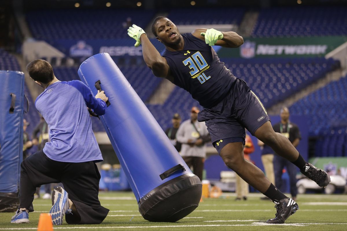 Michigan State defensive end Malik McDowell runs a drill at the NFL football scouting combine in Indianapolis, Sunday, March 5, 2017. (Michael Conroy / Associated Press)