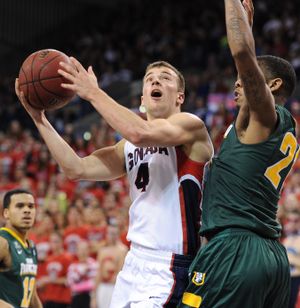 Gonzaga guard Kevin Pangos (4) shoots against San Francisco on Saturday. He finished with 11 points. (Tyler Tjomsland)