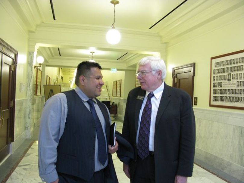 House Judiciary Chairman Jim Clark, R-Hayden Lake, right, talks with Chief Allan, chairman of the Coeur d'Alene Tribe, after the four-hour hearing Thursday on the tribe's proposed law enforcement legislation. (Betsy Russell)