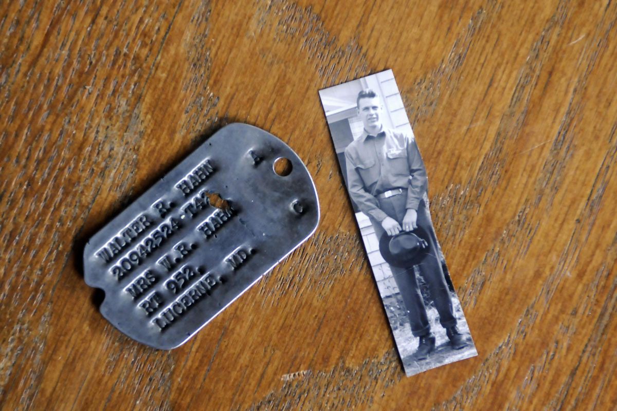 A dog tag found on Guadalcanal in 2003 belonged to Walter Ramond Hahn of Spokane (in photo at right), who died in battle on the island in WWII. The dog tag was given to Hahn