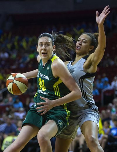 Seattle Storm's Breanna Stewart, left, is pursued by San Antonio Stars' Dearica Hamby during a WNBA basketball game at KeyArena, Wednesday, July 20, 2016 in Seattle. Stewart, the Storm’s rookie of the year, will be one player featured in the WNBA’s opening game on ESPN on May 13, 2017. (Sy Bean / Assocaited Press)