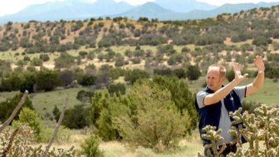 
Joe Sehee, of the Galisteo Basin Preserve,  stands in the basin south of Santa Fe, N.M.,  near a proposed 