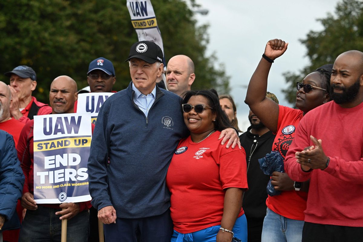 President Joe Biden joins a picket line with members of the United Auto Workers (UAW) union at a General Motors Service Parts Operations plant in Belleville, Michigan, on Sept. 26, 2023. (Jim Watson/AFP/Getty Images/TNS)  (Jim Watson/AFP/GETTY IMAGES NORTH AMERICA/TNS)