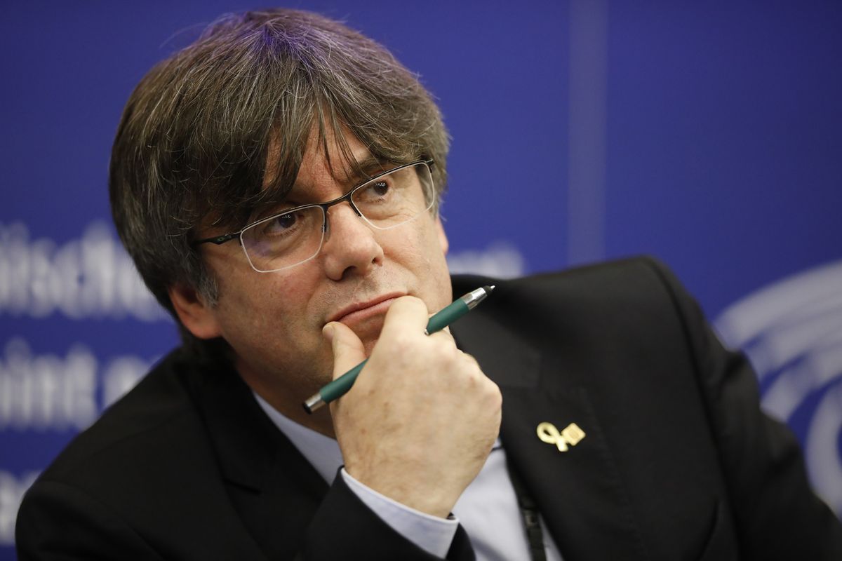 In this Monday Jan. 13, 2020 photo, Catalan leader Carles Puigdemont reacts during a press conference at the European Parliament in Strasbourg, eastern France. Catalonia’s former regional president Carles Puigdemont says that he will continue to fight extradition back to Spain if, as he expects, the European Union Parliament strips him of his immunity as a continental lawmaker this week. On Monday March 8, 2021, Puigdemont, along with cohorts Toni Comín and Clara Ponsatí, face a vote by the European Parliament to lift their immunity as lawmakers as has been recommended by the parliament’s Legal Affairs Committee.  (Jean-Francois Badias)