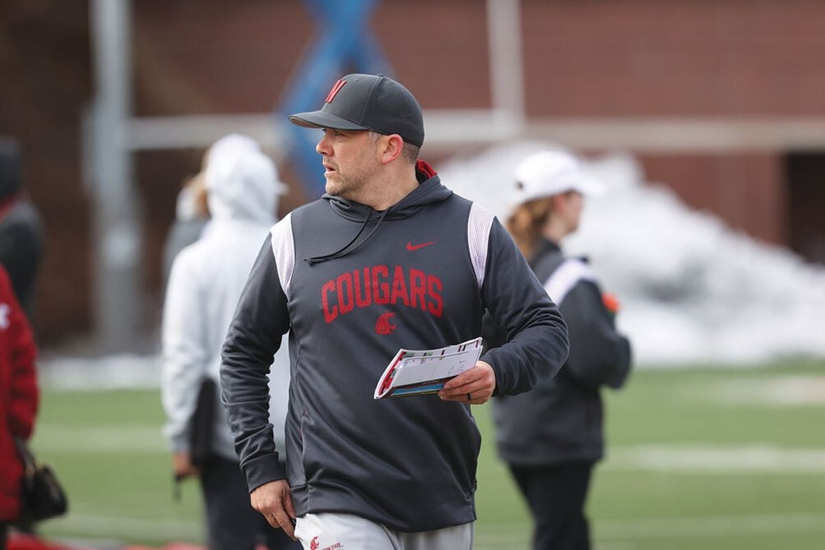 COURTESY/WSU Athletics Washington State defensive coordinator Jeff Schmedding watches during a recent spring camp practice at Rogers Field in Pullman.  (SSR)