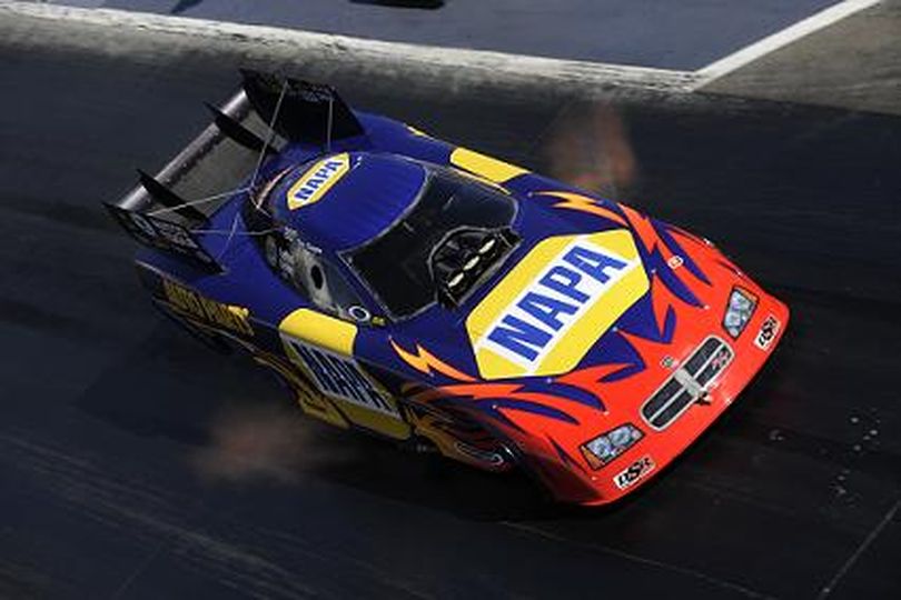 Ron Capps, driver of the NAPA Auto Parts Dodge NHRA Full Throttle Funny Car, jets down the strip. (Photo courtesy of NHRA) (The Spokesman-Review)