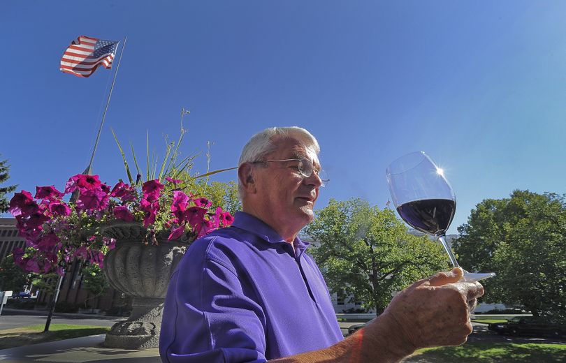 Myles Anderson, enjoying a glass of his merlot on Aug. 9 in Spokane, is the 2011 inductee to the Washington Wine Hall of Fame. “Having wine at the table is a celebratory experience. Embracing people with wine is something I’ve always done,” he says. (Christopher Anderson)