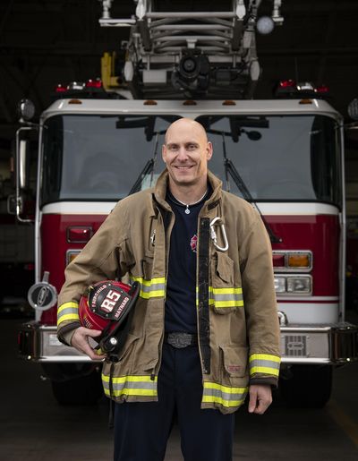 Kris Maynard, 42, a Mead resident and civilian firefighter and EMT at Fairchild Air Force base also works with his wife to raise awareness about diabetes along with the message that many people are prediabetic and don’t know it. (Colin Mulvany / The Spokesman-Review)