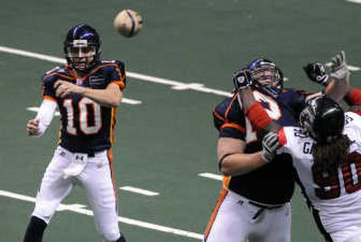 Spokane Shock quarterback Nick Davila unleashes a pass during a May 31 game against visiting Stockton. 
 (PHOTOS BY Dan Pelle / The Spokesman-Review)