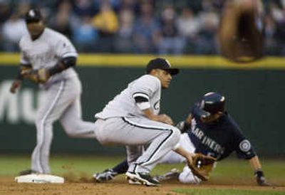
Seattle's Ichiro Suzuki steals second ahead of the throw to White Sox shortstop Orlando Cabrera. Associated Press
 (Associated Press / The Spokesman-Review)