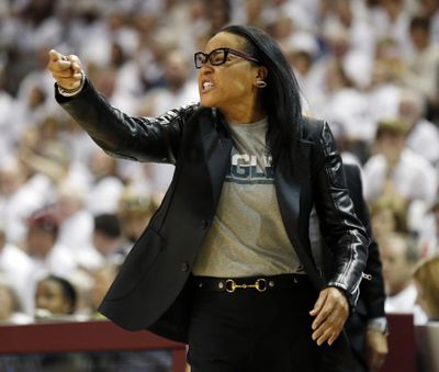 South Carolina head coach Dawn Staley gestures to her players during the first half of an NCAA college basketball game against Mississippi State in Starkville, Miss., Monday, Feb. 5, 2018. (Rogelio V. Solis / Associated Press)