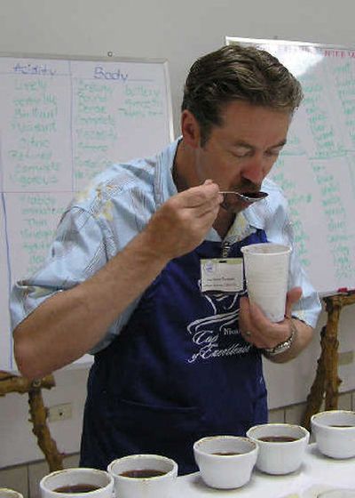 
Simon Craven- Thompson cups coffees in Nicaragua for the Cup of Excellence competition.
 (Courtesy of Craven-Thompson / The Spokesman-Review)
