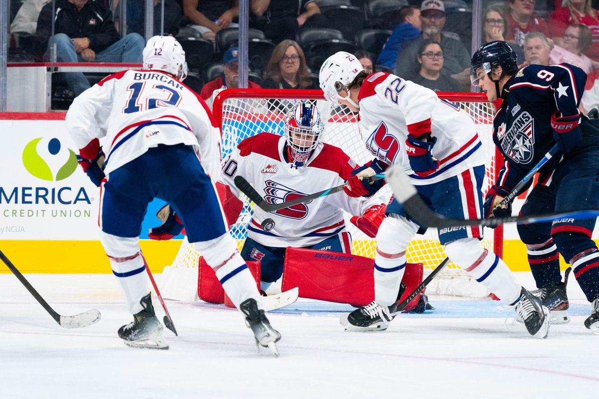 Spokane Chiefs goalie Carter Esler makes one of his 19 saves in a shutout of the Tri-City Americans on Saturday at Numerica Veterans Arena. (Larry Brunt/Spokane Chiefs)