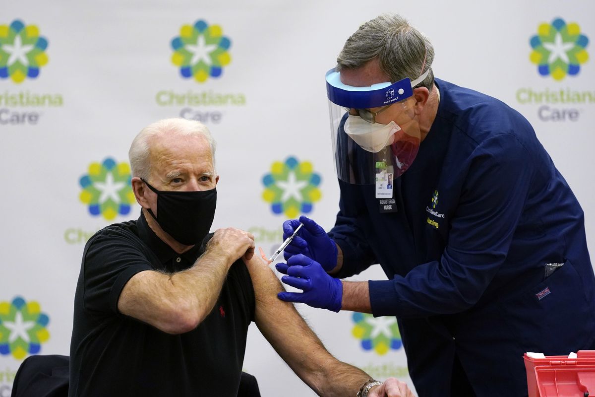 President-elect Joe Biden receives his second dose of the coronavirus vaccine at ChristianaCare Christiana Hospital in Newark, Del., Monday, Jan. 11, 2021. The vaccine is being administered by Chief Nurse Executive Ric Cuming.  (Susan Walsh)