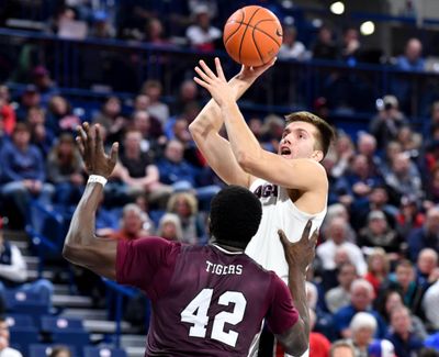 Gonzaga forward Filip Petrusev elevates over Texas Southern’s Jethro Tshisumpa during the second half of Wednesday’s game at the McCarthey Athletic Center. (Tyler Tjomsland / The Spokesman-Review)