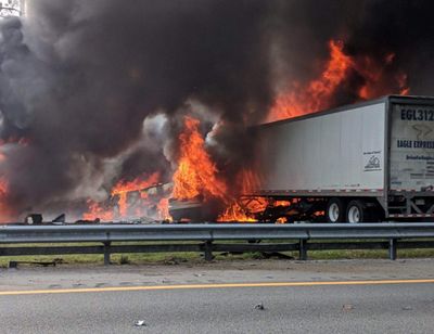 Flames engulf vehicles after a fiery crash along Interstate 75, on Thursday, Jan. 3, 2019, about a mile south of Alachua, near Gainesville, Fla. Highway officials say at least six people have died after a crash and diesel fuel spill sparked a massive fire along the Florida interstate. (AP)